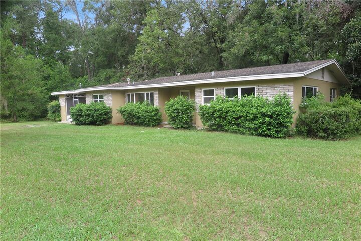 Property Photo:  23376 NW County Road 236  FL 32643 