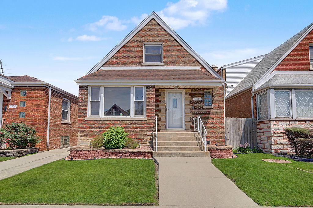 Property Photo: 11011 S Avenue L IL 60617