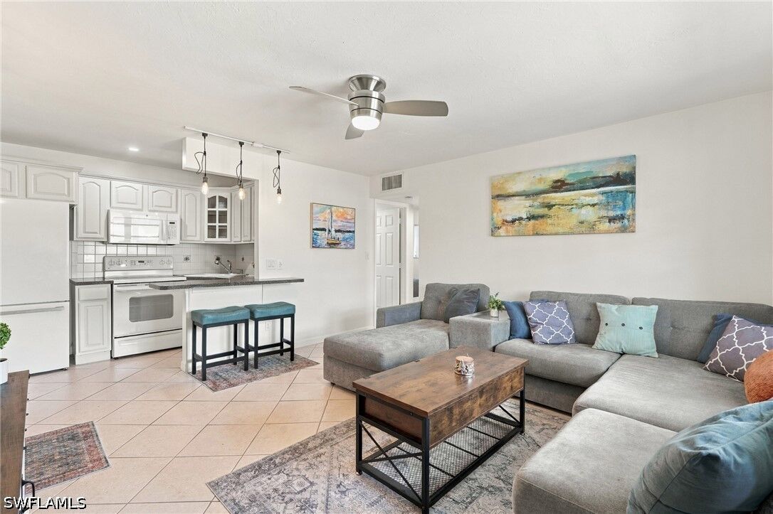 Property Photo:  457 Tallwood Street 408  FL 34145 