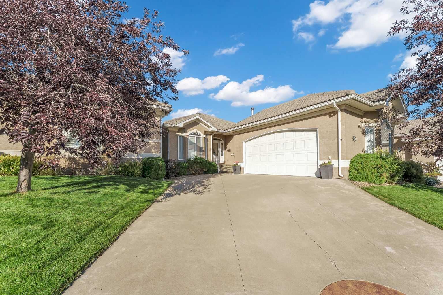 Property Photo: 16 River Ridge Court NW AB T1A 8V4
