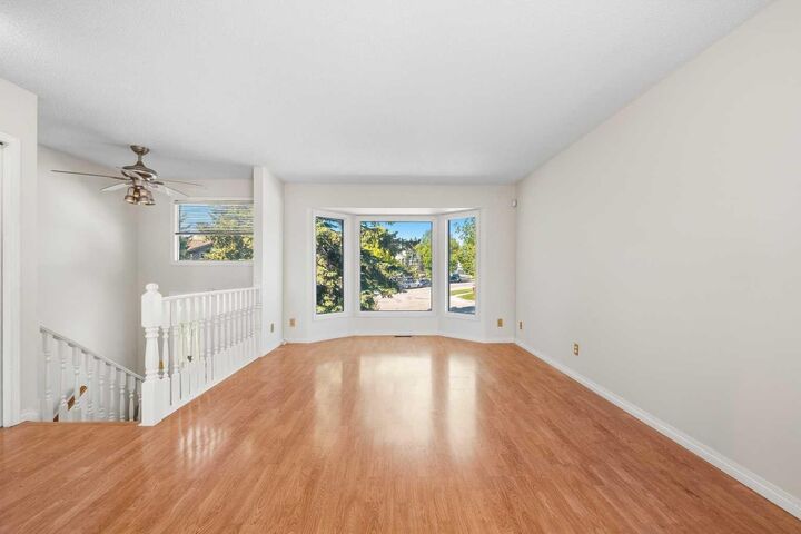 Property Photo:  243 Millcrest Way SW  AB T2Y 2K7 