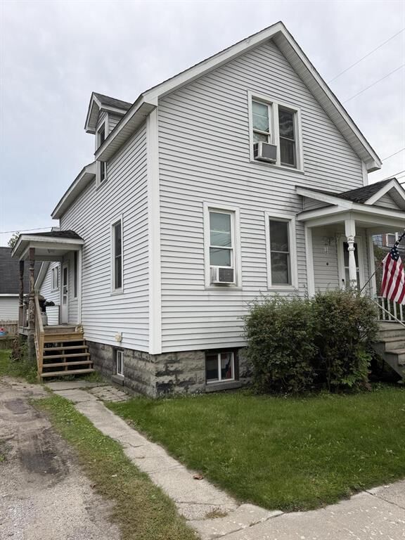 Property Photo:  210 S 7th Avenue  MI 49707 