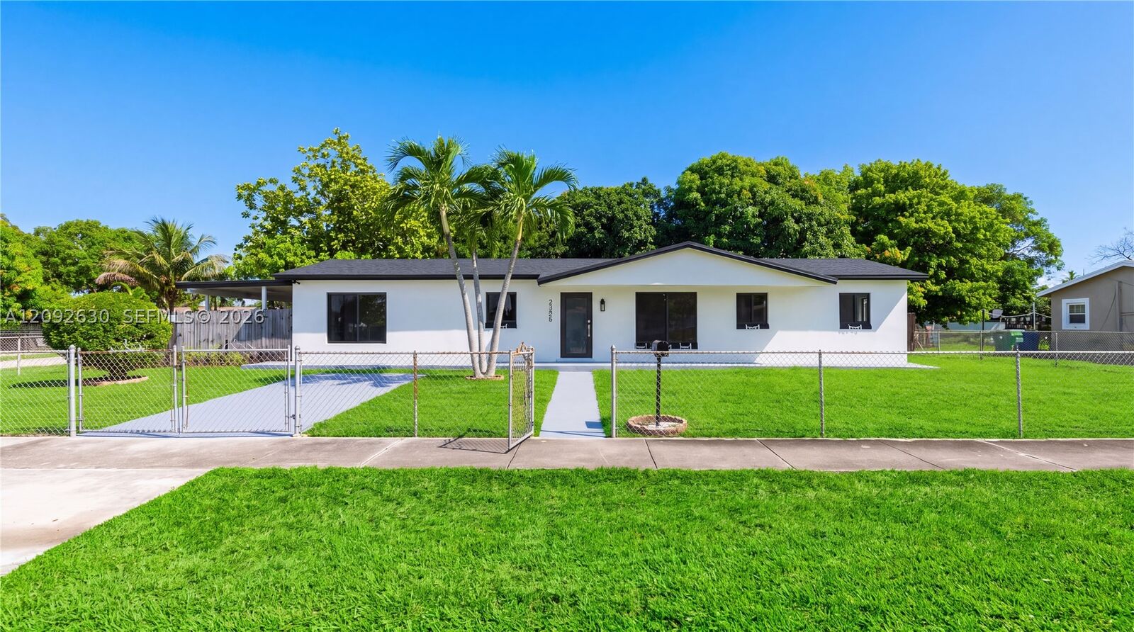 Property Photo: 3355 NW 180th St FL 33056