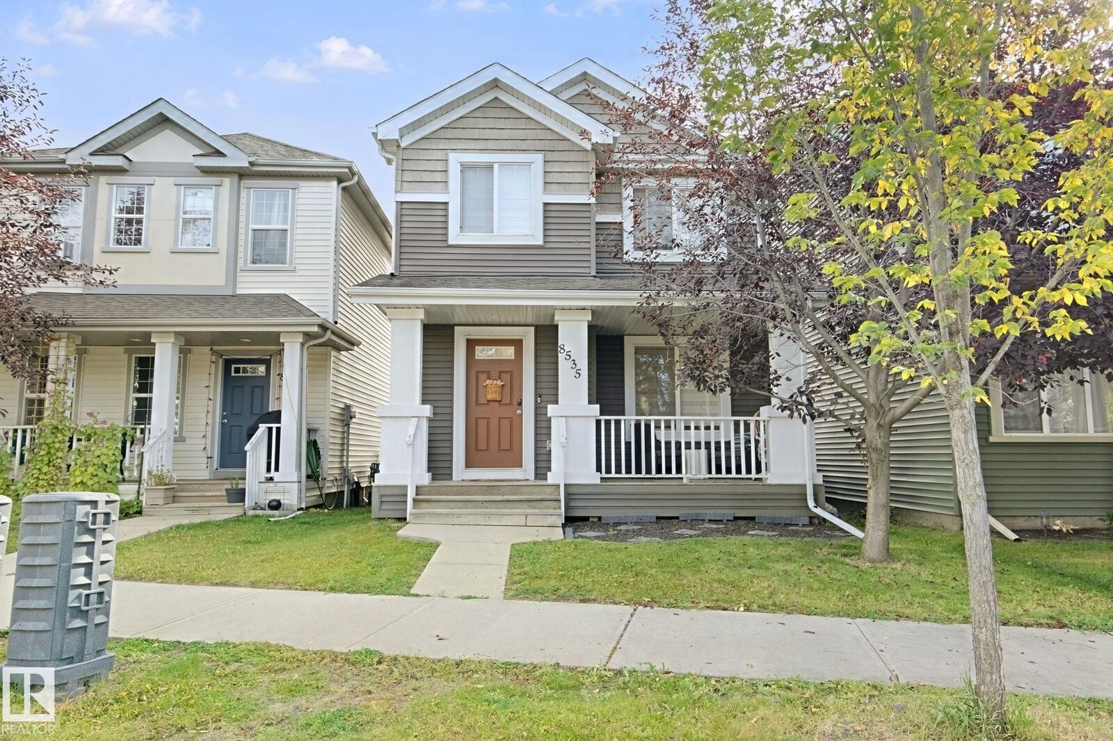 Property Photo:  8535 Ellis Link Link NW  AB T6M 0P5 