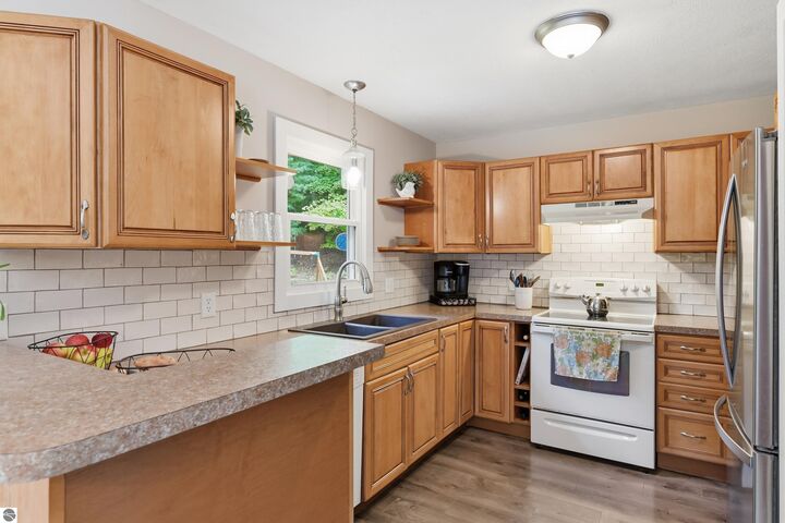 Property Photo:  3061 N Arbutus Lake Road  MI 49684 