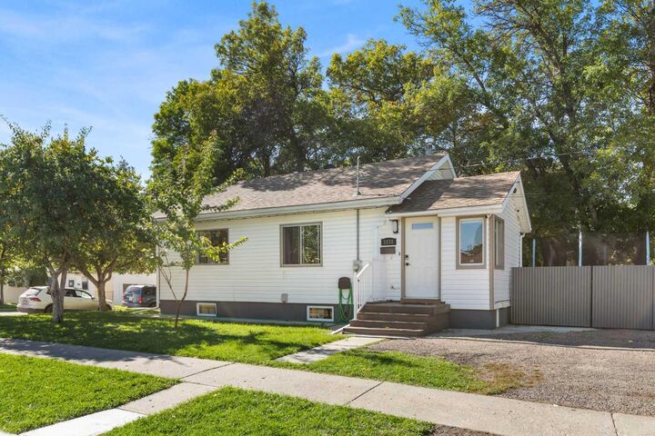 Property Photo:  1178 Queen Street SE  AB T1A 1B4 
