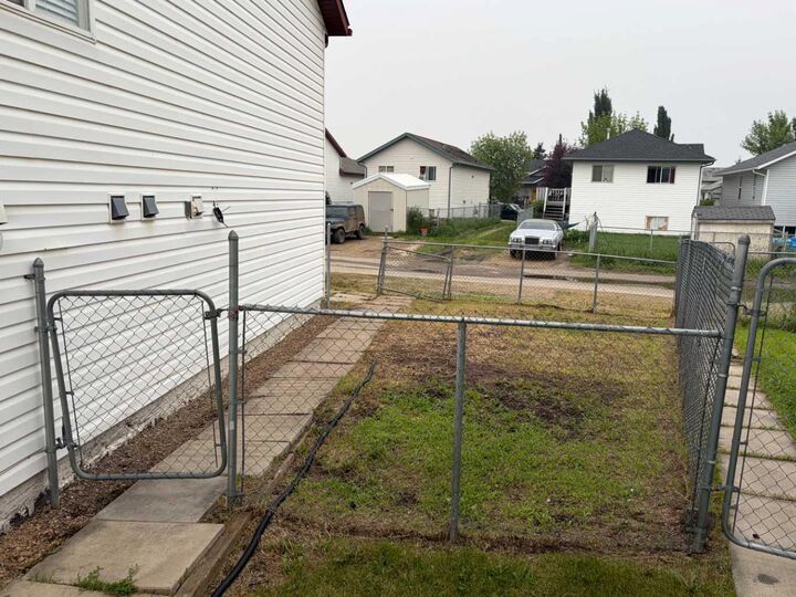 Property Photo: 7213 105 Street AB T8W 2S6