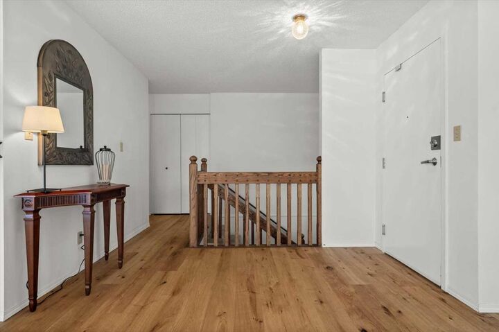 Property Photo:  3719B 49 Street NW 406  AB T3A 2E3 
