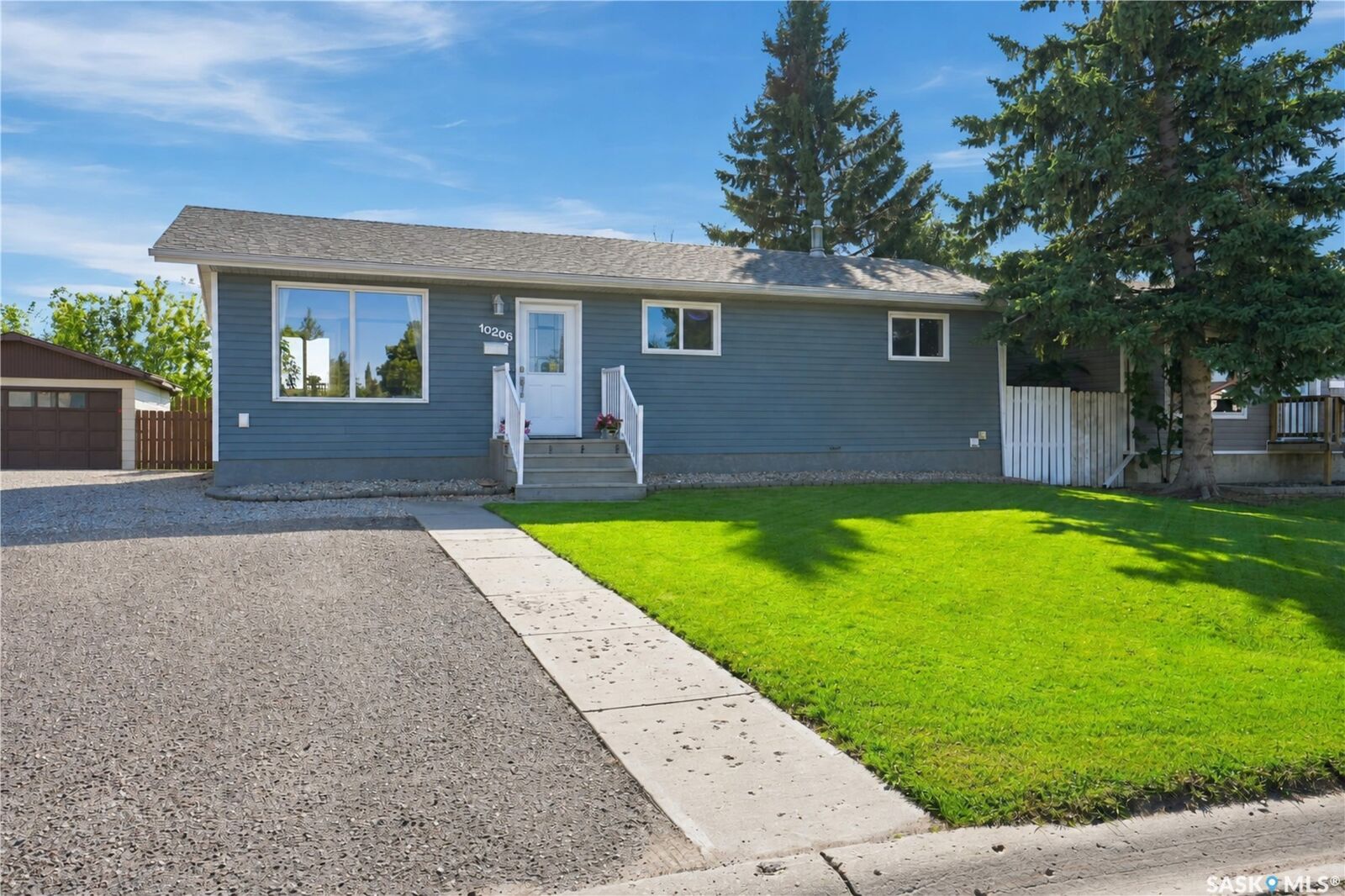 Property Photo: 10206 Ross Crescent SK S9A 3R6