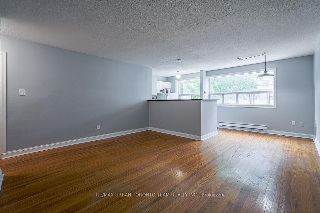 Property Photo:  1346 Queen Street E 1  ON M4L 1C5 