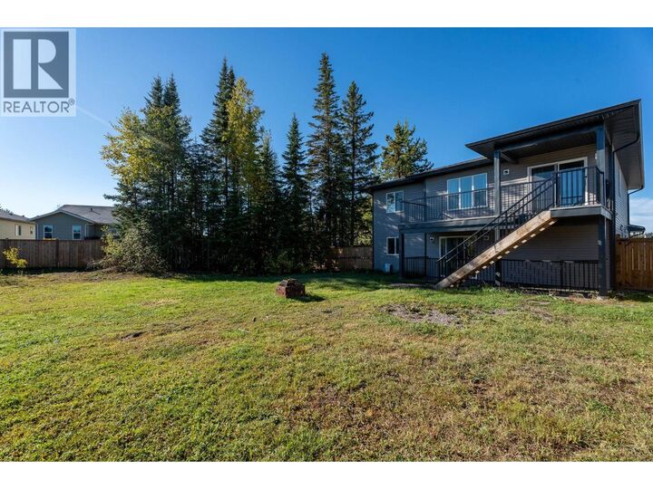 Property Photo:  5590 Woodvaley Drive  BC V2K 5A6 