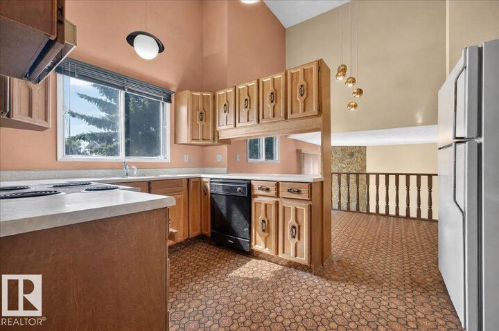 Property Photo:  18311 77 Avenue NW  AB T5T 2G5 