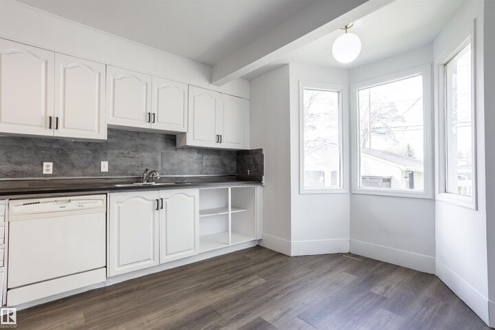 Property Photo:  13716 115 Avenue NW  AB T5M 3B3 