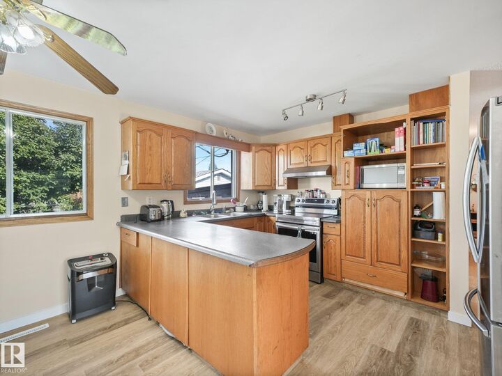 Property Photo:  7520 130 Avenue NW  AB T5C 1Y2 