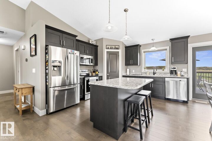 Property Photo:  5705 49 Street  AB T9M 0E8 