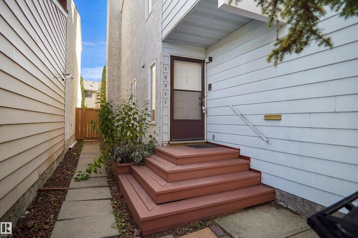 Property Photo:  12311 25 Avenue NW  AB T6J 4S7 