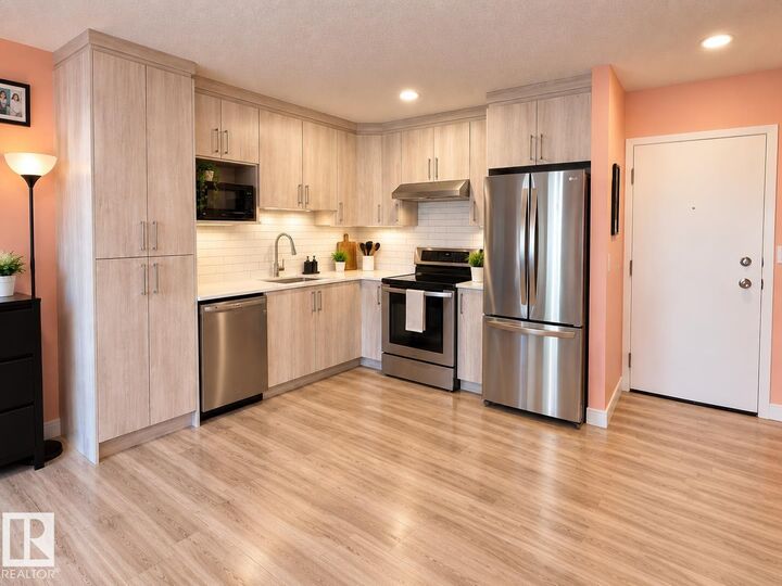 Property Photo: 2624 Mill Woods Road NW 108 AB T6L 5K7