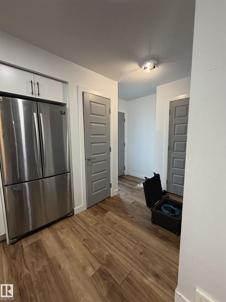 Property Photo:  11442 82 Street NW  AB T5B 2V4 