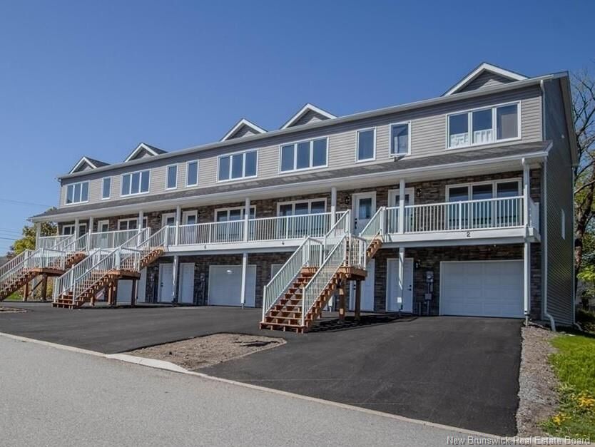 Property Photo:  4 Rockingstone Drive  NB E2M 0B5 