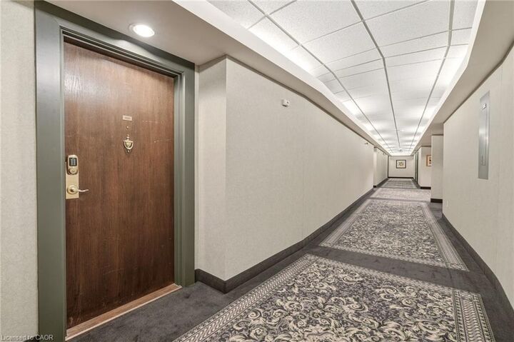 Property Photo:  77 Governor's Road 404  ON L9H 7N8 