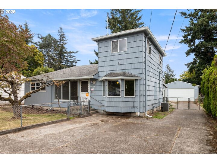 Property Photo:  13056 SE Center St  OR 97236 