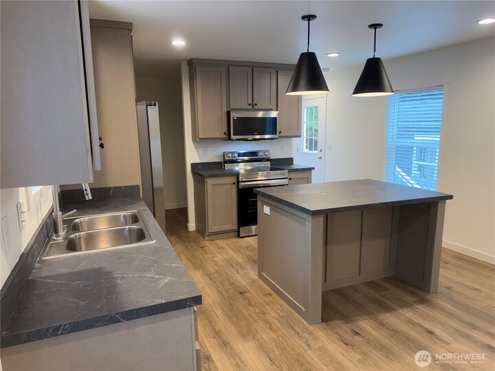 Property Photo:  375  Union Avenue SE 8  WA 98059 