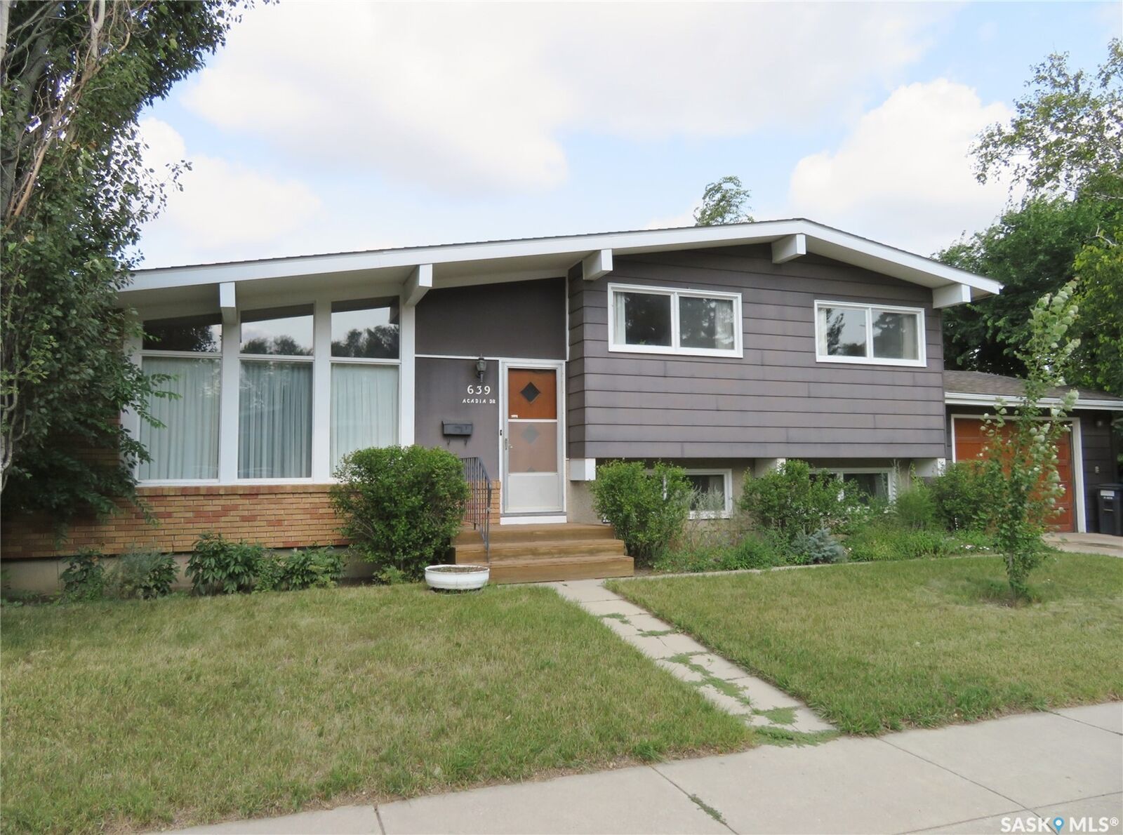 Property Photo:  639 Acadia Drive  SK S7H 3V8 