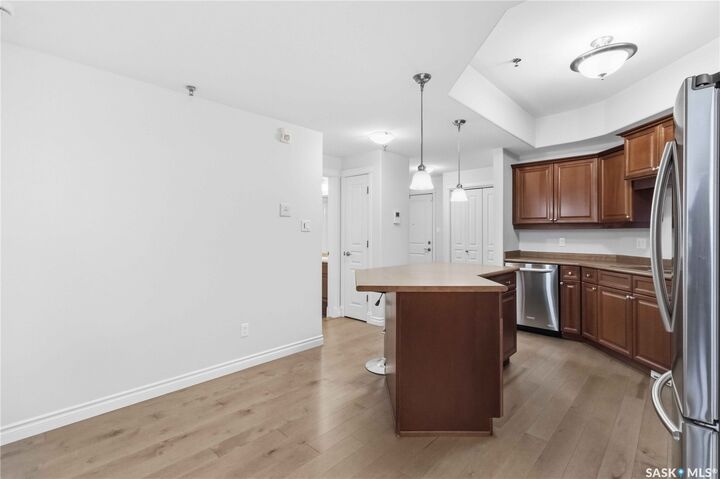 Property Photo:  619 Saskatchewan Crescent W 112  SK S7M 0A5 