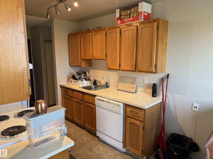Property Photo:  3611 145 Avenue NW 414  AB T5Y 2L7 