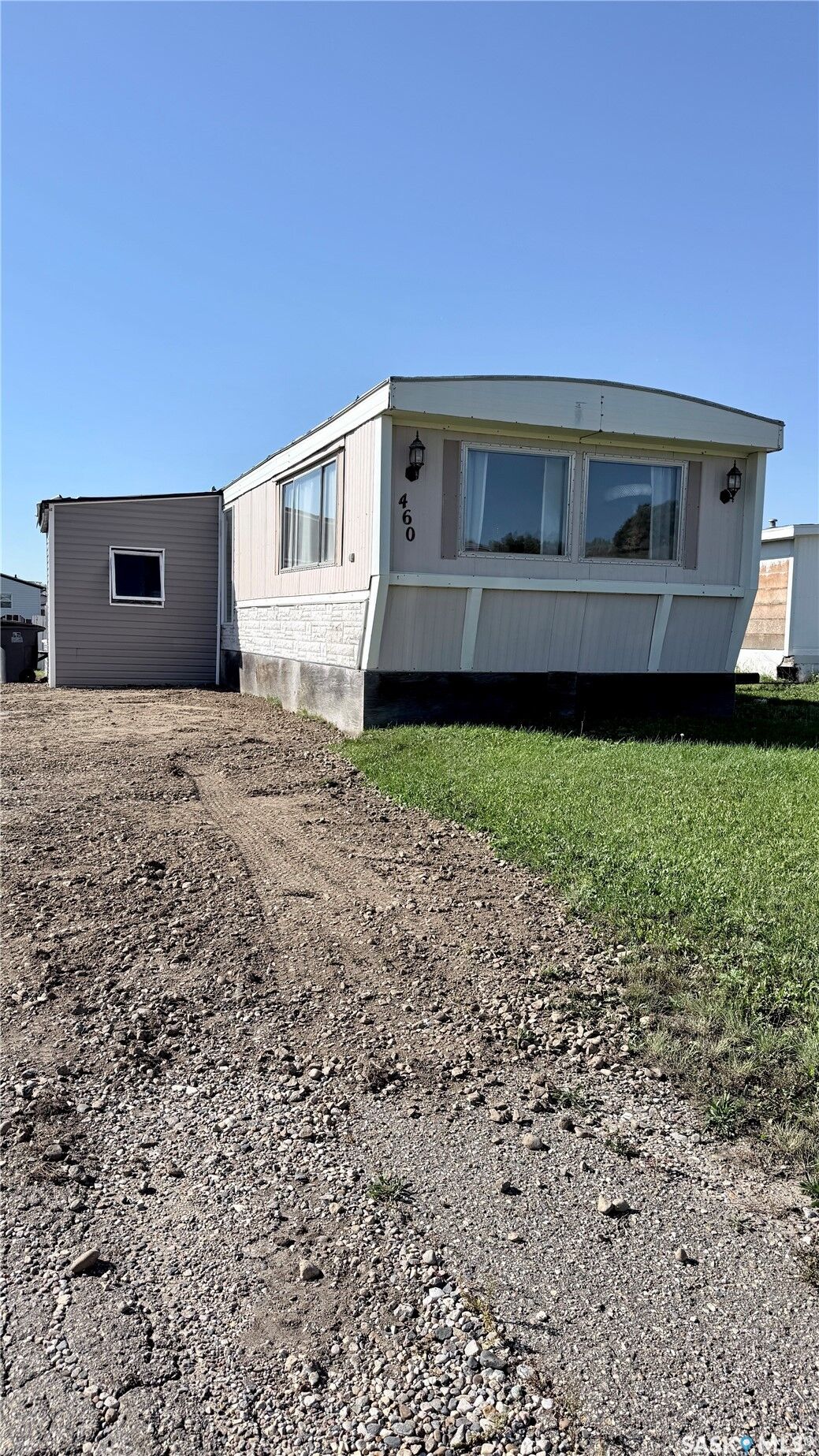 Property Photo:  460 Willow Park Greens  SK S4A 2S2 