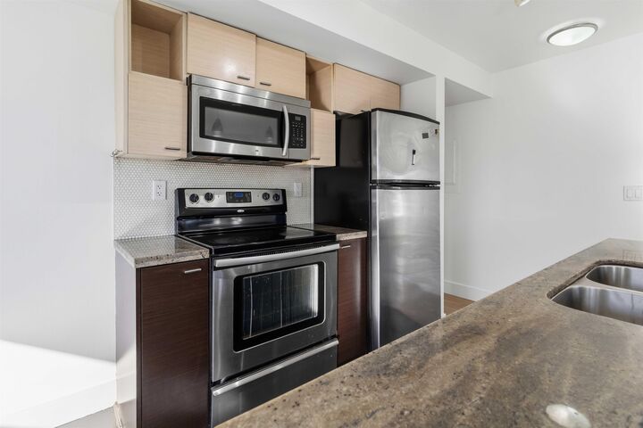Property Photo:  7445 120 Street 204  BC V4C 0B3 
