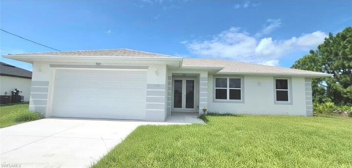 Property Photo:  370 Chalet Ave S  FL 33974 