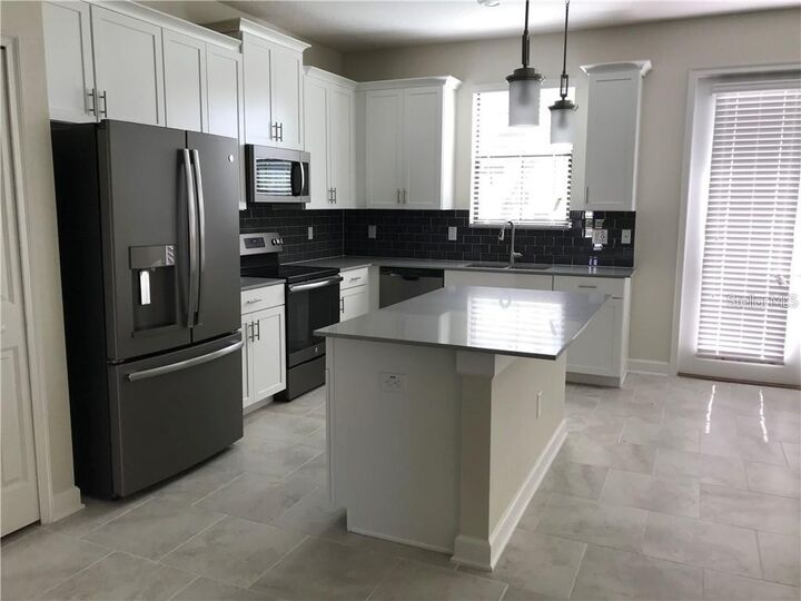 Property Photo:  11403 Whistling Pine Way  FL 32832 