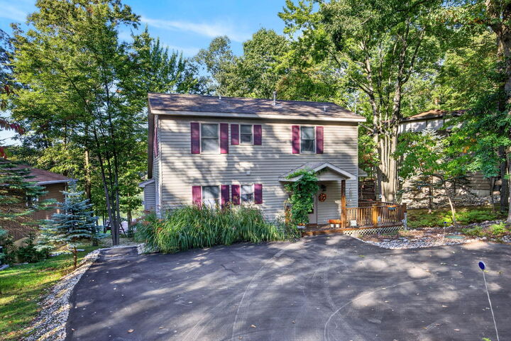 Property Photo:  8665 N Island Drive  MI 49346 