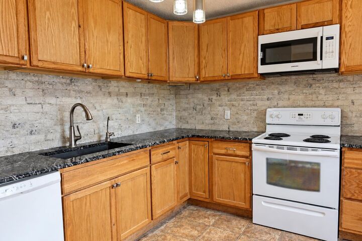 Property Photo:  7817 Cedarwood Park  AB T8V 4R8 