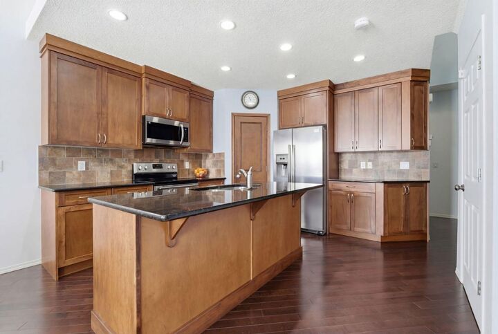 Property Photo:  512 Panatella Square NW  AB T3K 0T5 