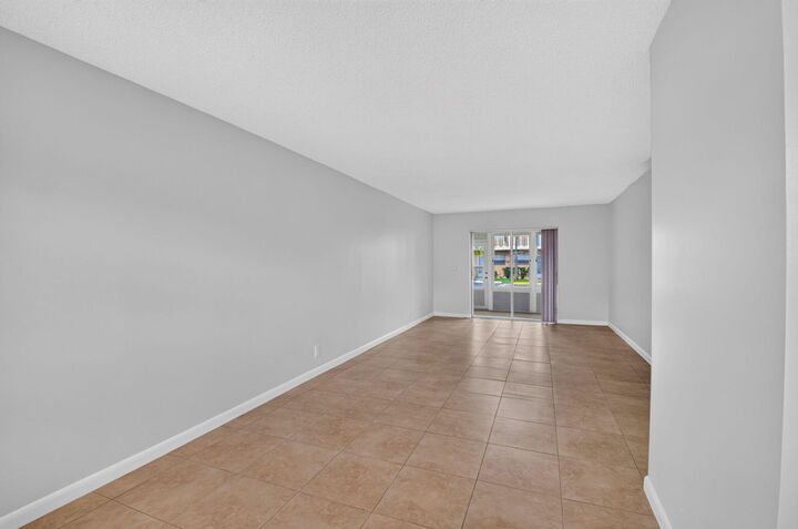 Property Photo: 2192 NE 1st Way 104 FL 33435