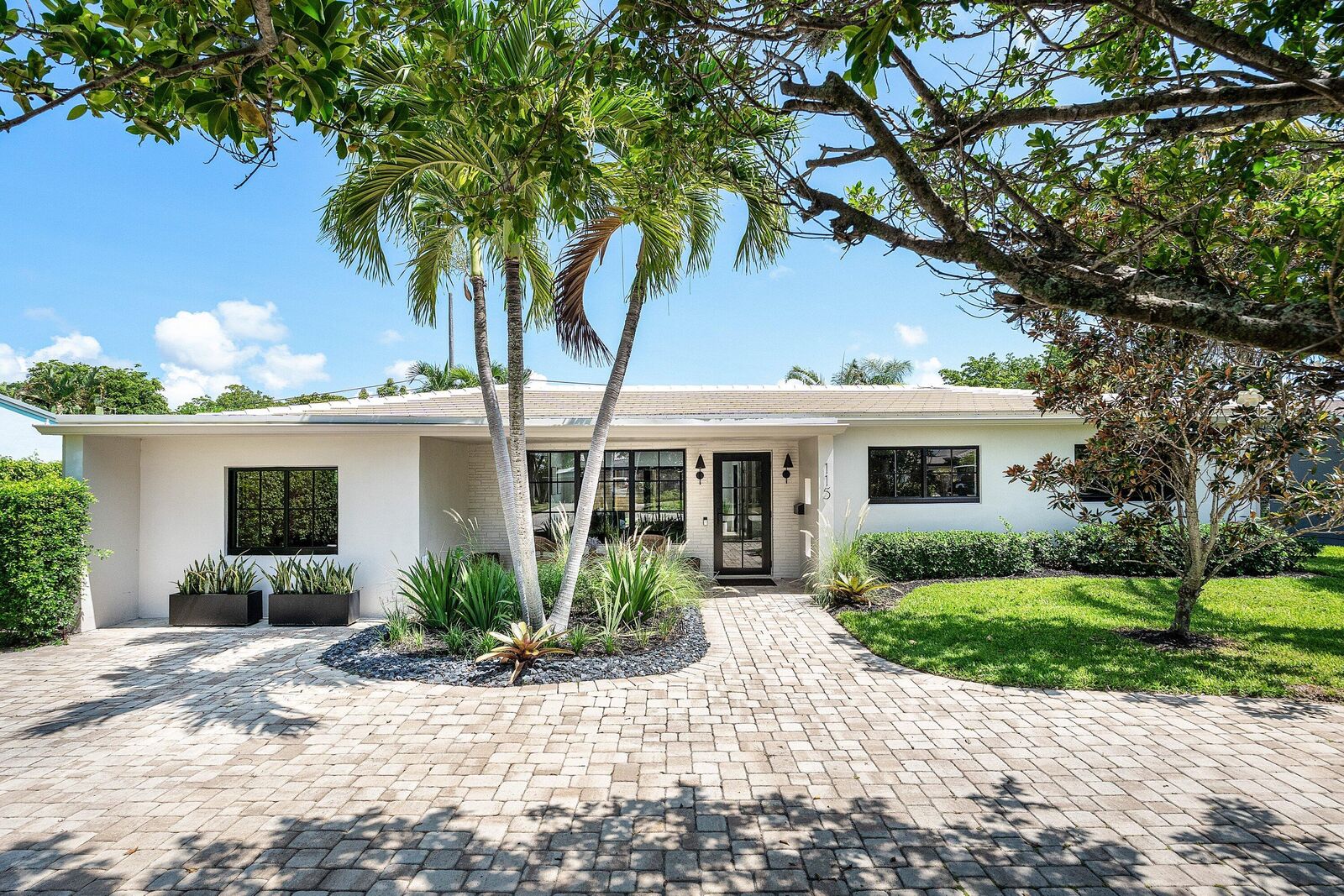 Property Photo:  115 Bonnie Briar Lane  FL 33444 