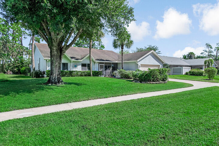 Property Photo:  102 Sevilla Avenue  FL 33411 