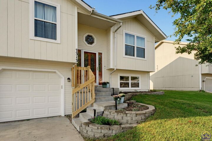 Property Photo:  7313 SW 23rd Ter  KS 66614 