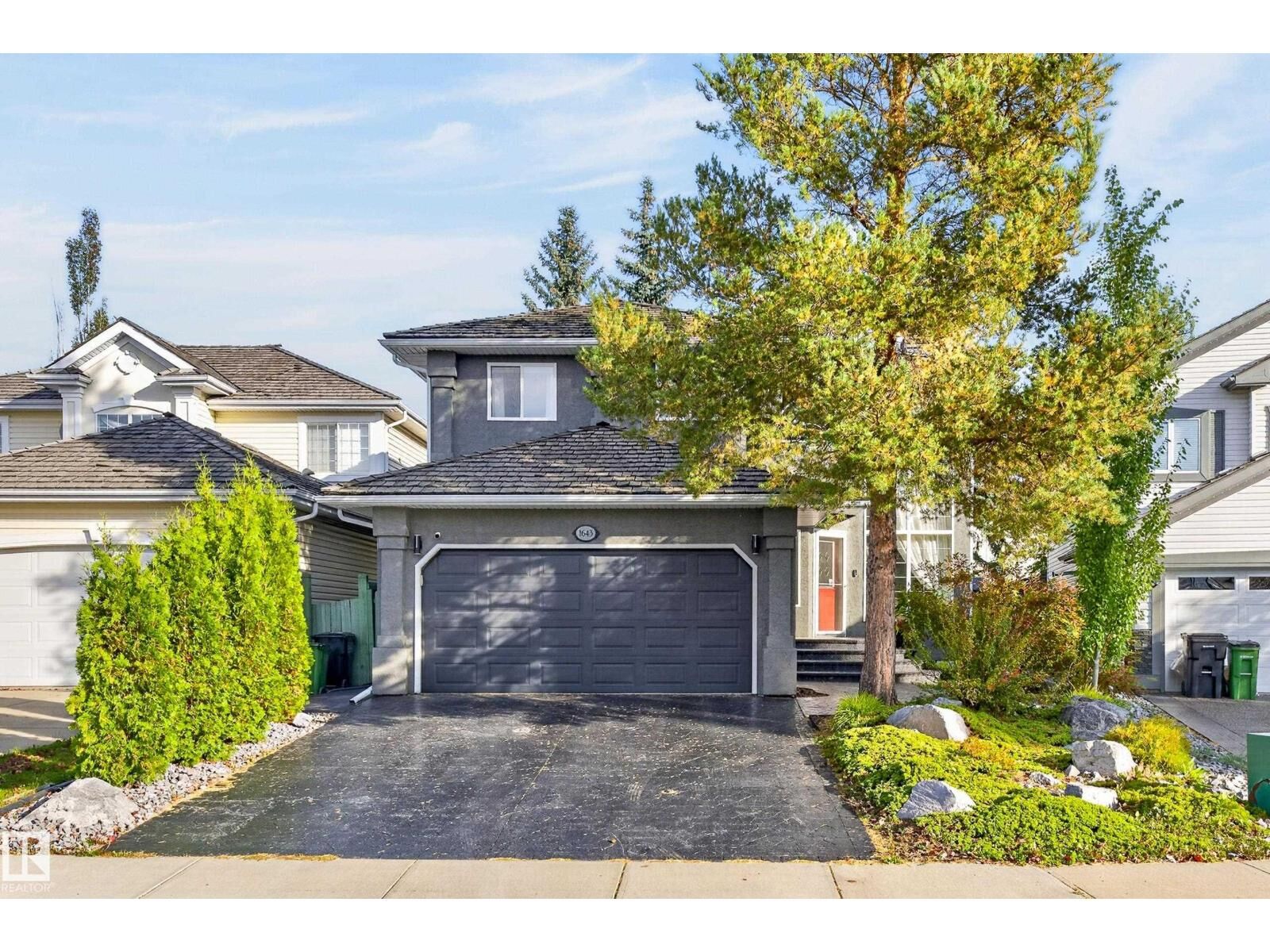 Property Photo: 1643 Welbourn Cove Cv NW AB T6M 2M4