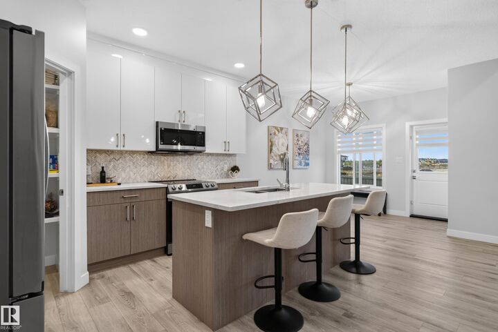Property Photo:  103 Edgefield Way  AB T8N 8A8 