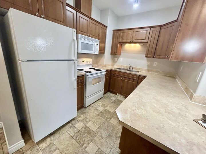 Property Photo:  9229 Lakeland Drive 105  AB T8X 0B8 