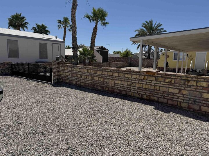 Property Photo:  13619 E 49 Dr  AZ 85367 