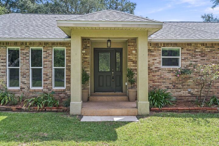 Property Photo:  7555 Allie Grimes Road  FL 32566 