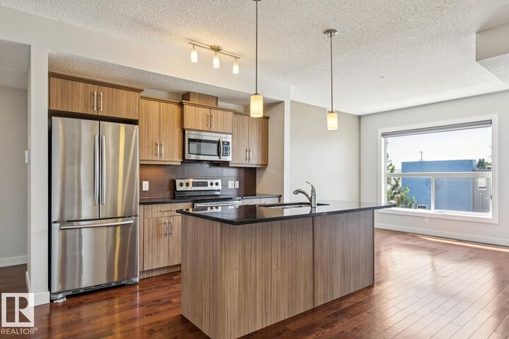 Property Photo:  10523 123 Street NW 217  AB T5N 1N9 