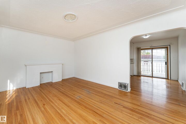 Property Photo: 10719 132 Street NW AB T5M 1C8