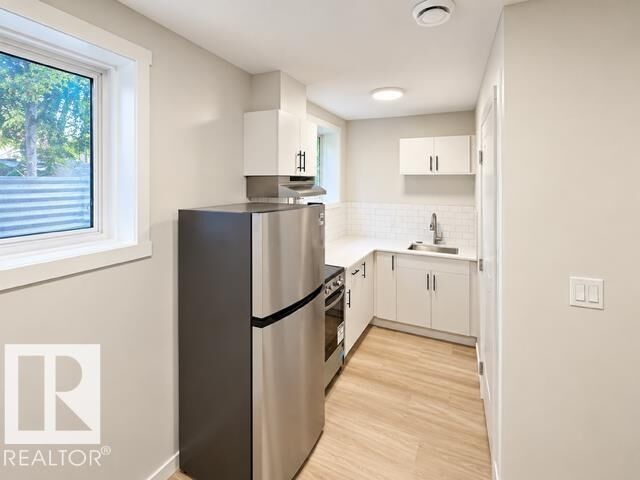 Property Photo:  12038 62 Street NW Bsmt  AB T5W 4C8 