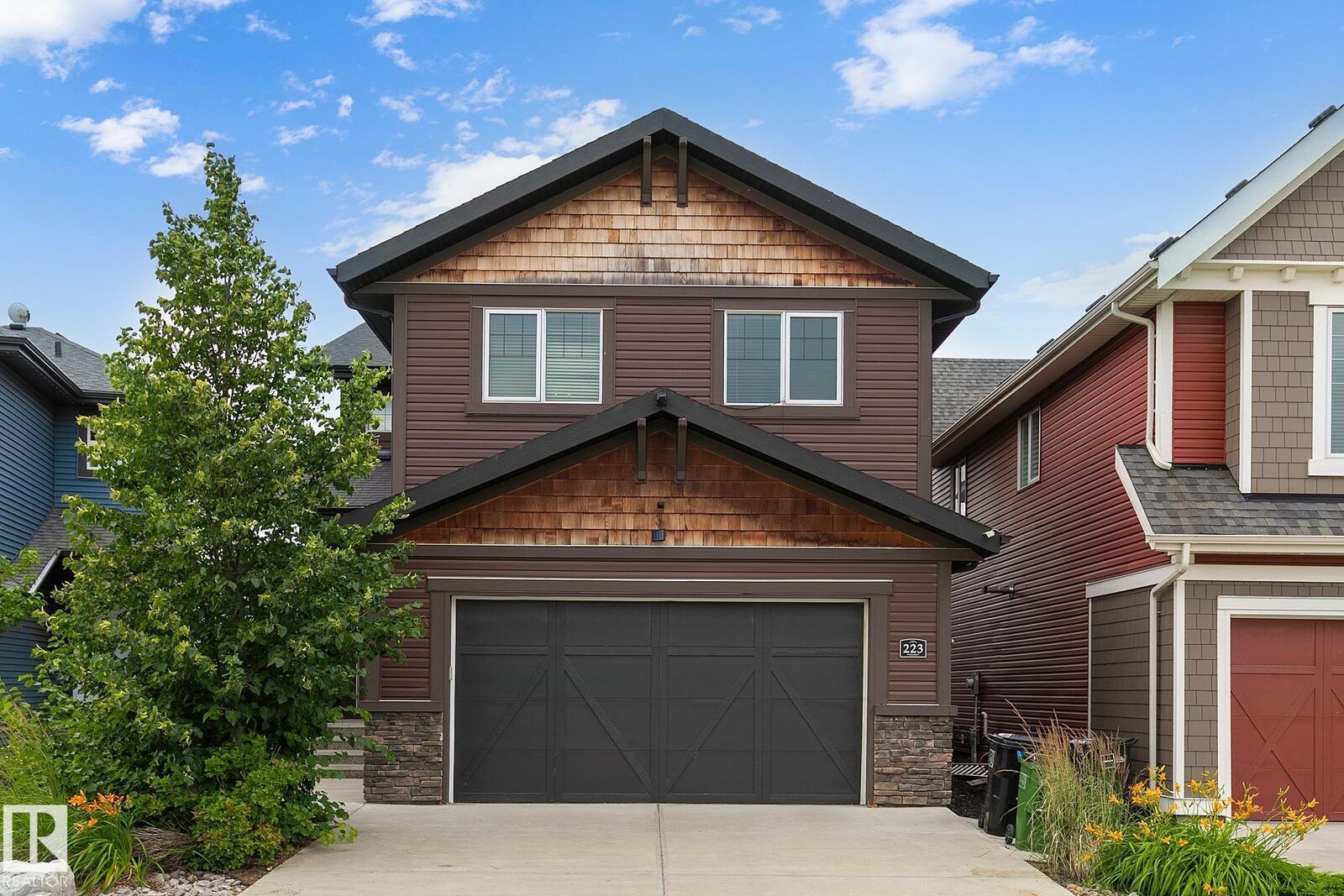 Property Photo:  223 Hawks Ridge Boulevard NW  AB T5S 0M1 