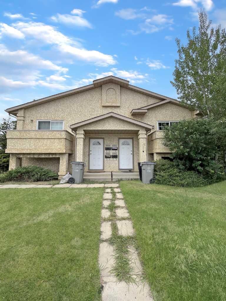 Property Photo:  9406 100 Avenue B  AB T8V 0S9 